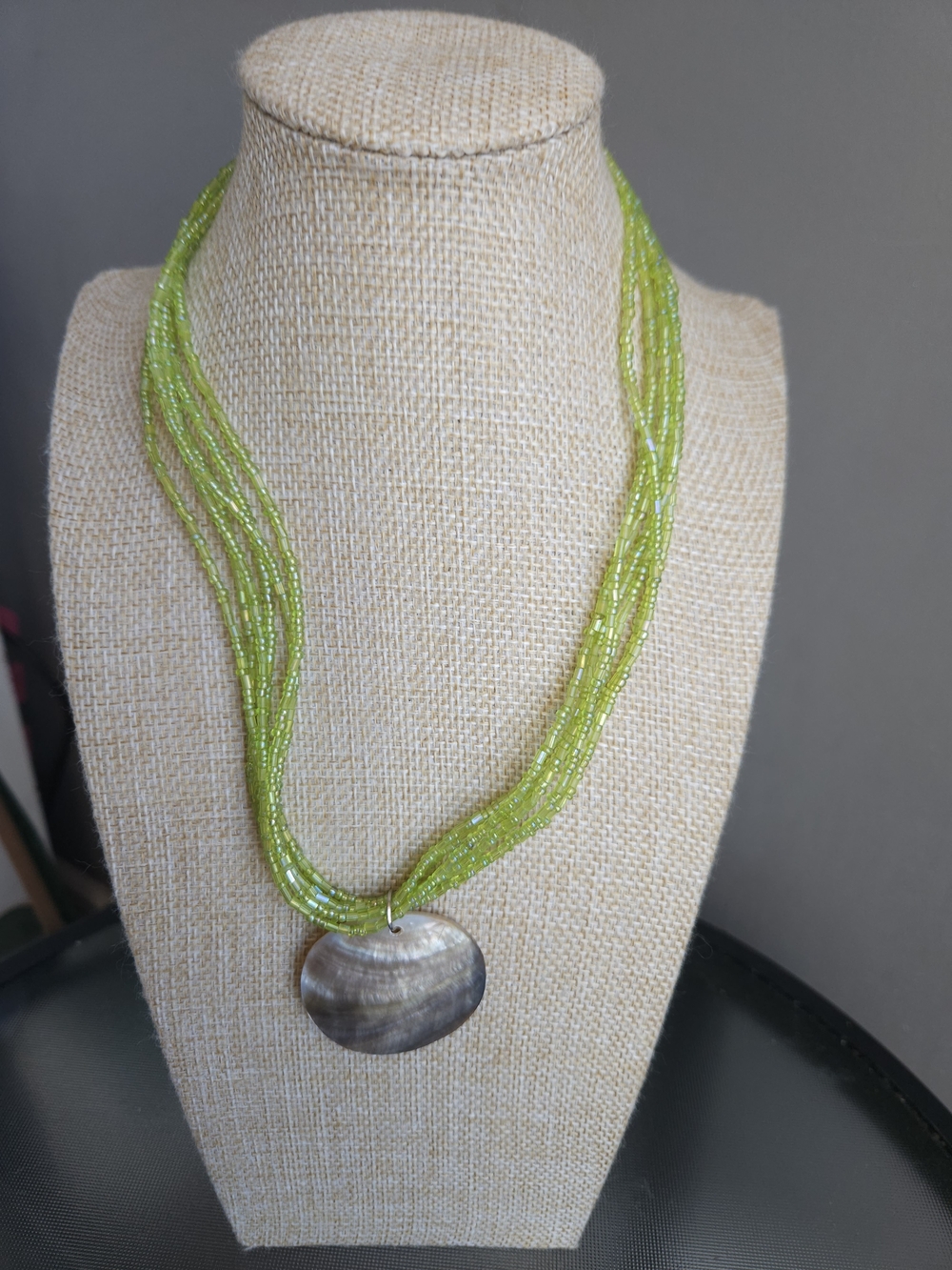 Green Multi-Strand Beaded Necklace with Shell Pendant